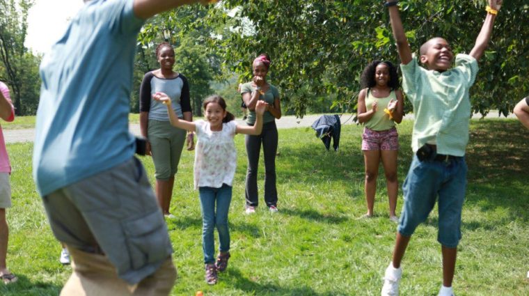 Scholars jumping during Field Day 2012